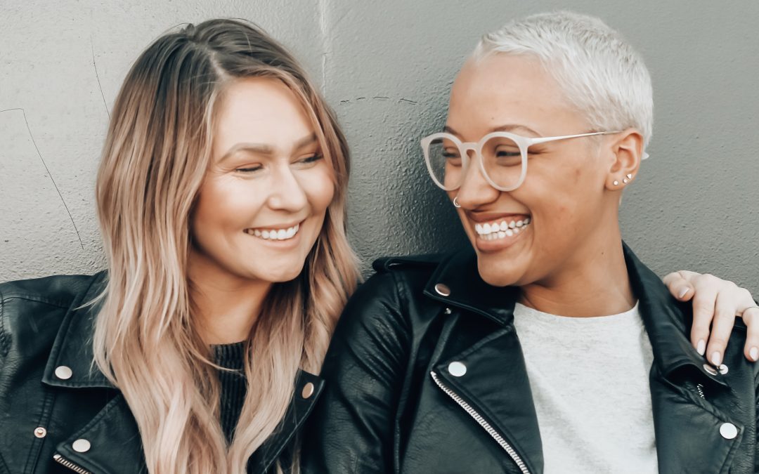 Two women smiling