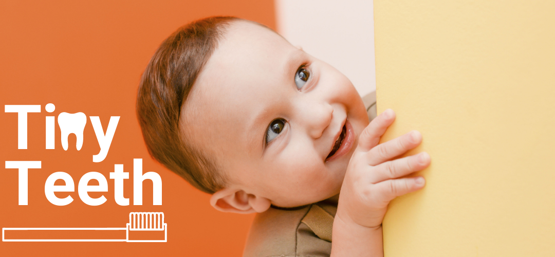 baby smiling with phrase tiny teeth